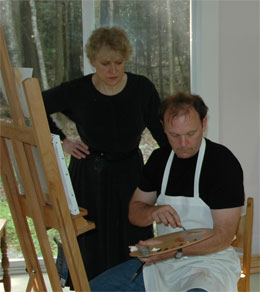 leah kristin dahlgren teaching one of her art classes with student doug challenger